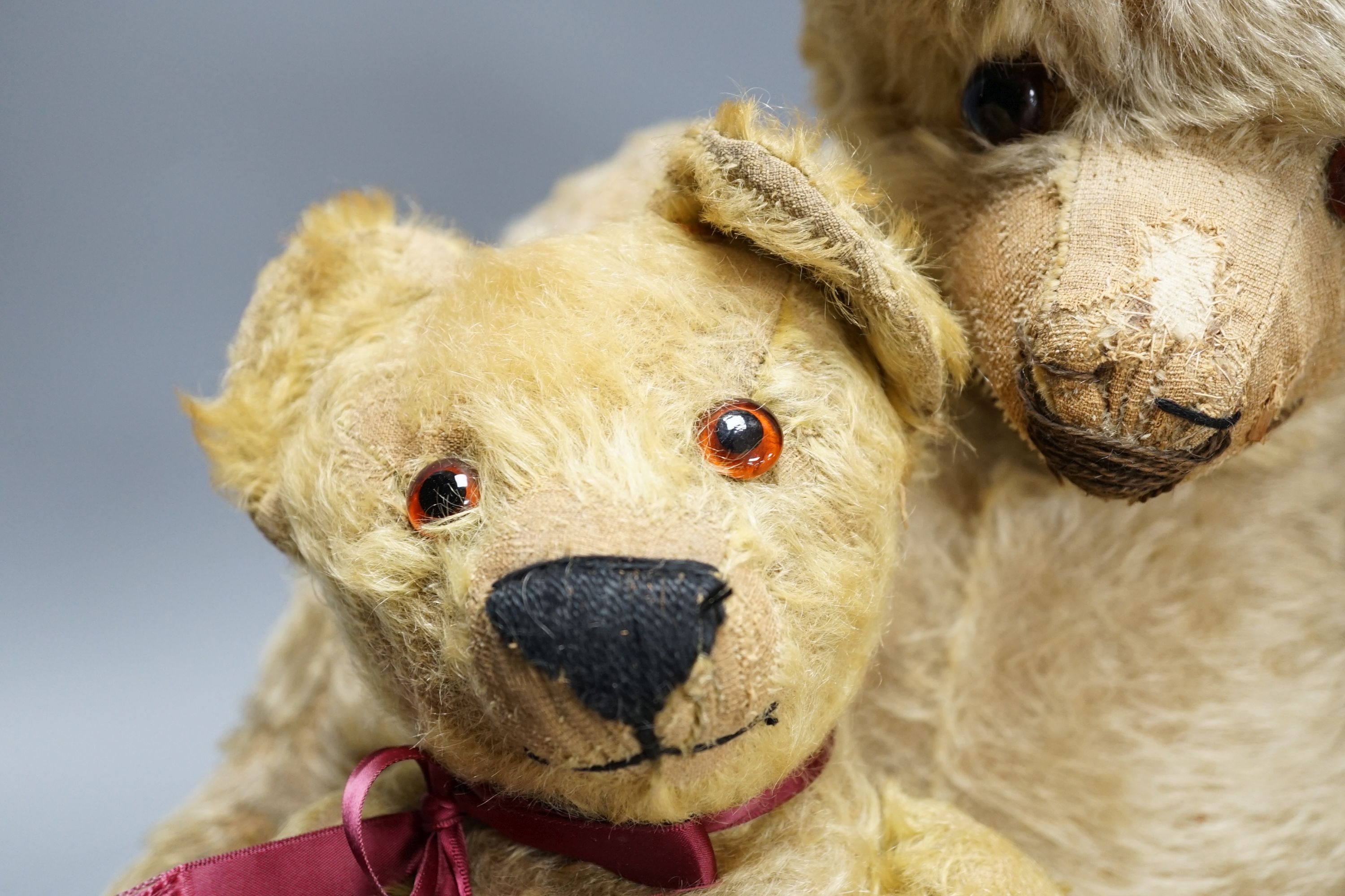 A large 1920's Chad Valley Teddy bear, 75cm, together with another 1920's Chad Valley Teddy bear, play-worn